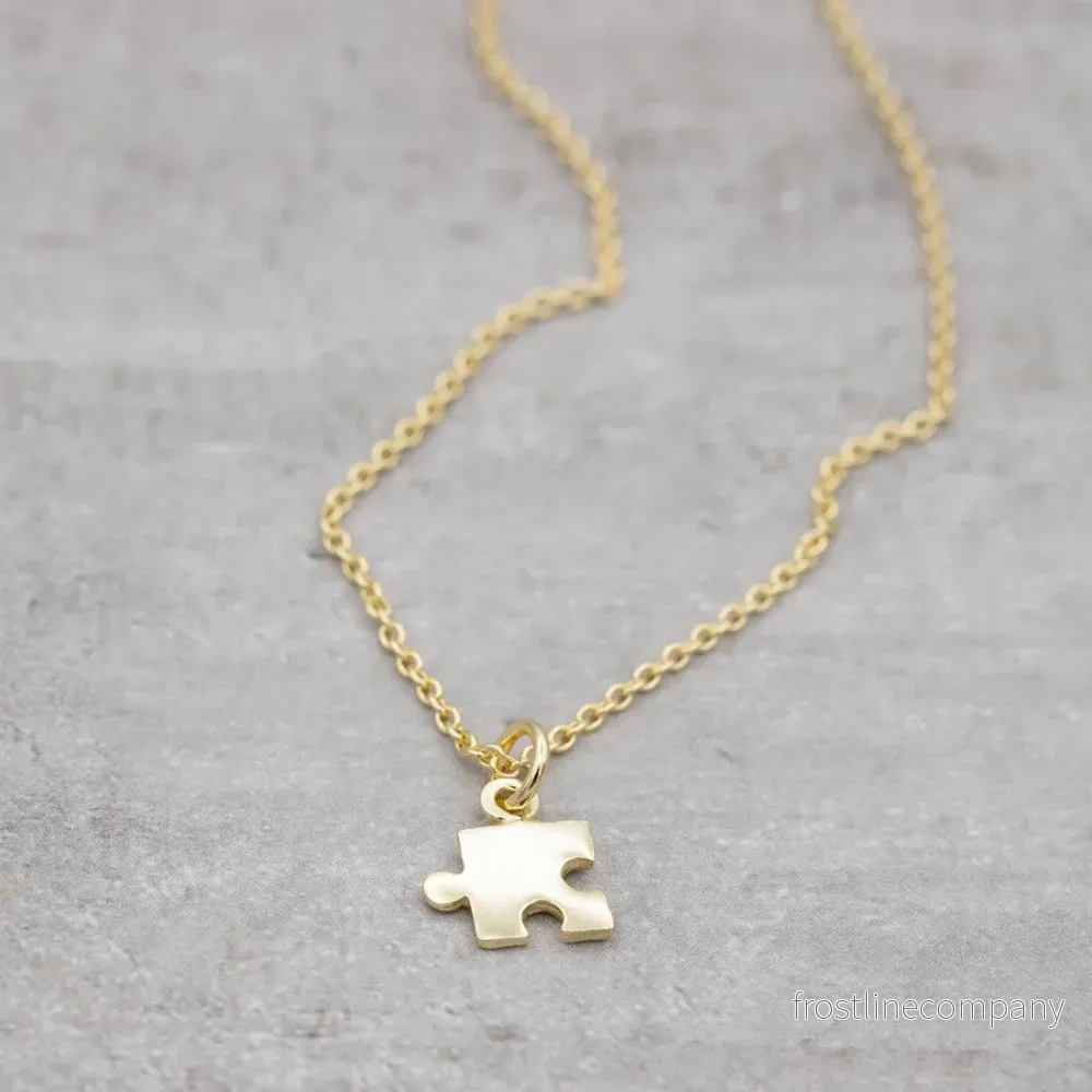 Halsband guld pusselbit Halsband guld pusselbit