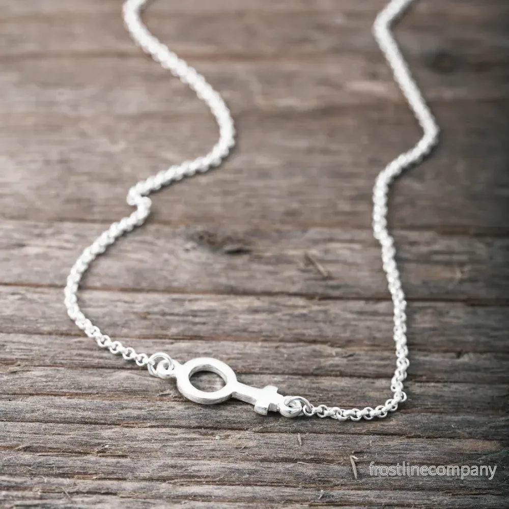 Halsband kvinnotecken silver Halsband kvinnotecken silver