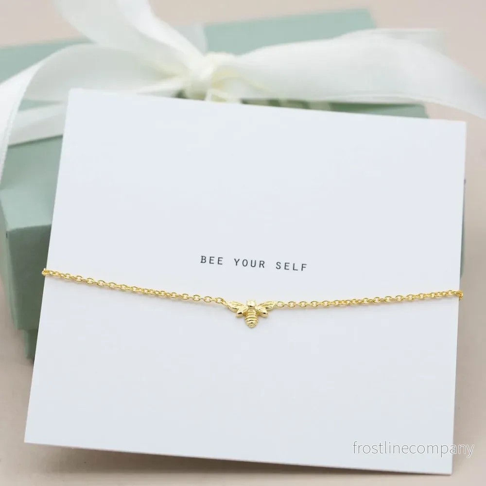 Armband i guld bee your self Armband i guld bee your self