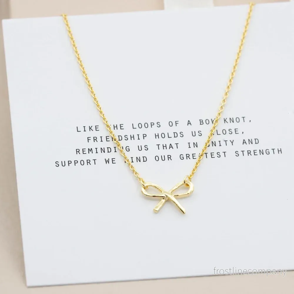 Halsband i guld rosett Halsband i guld rosett