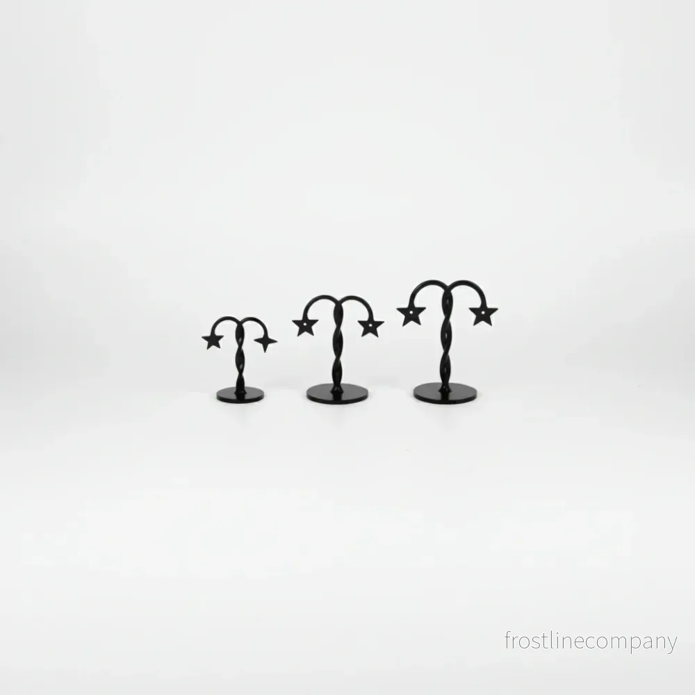 Örhängesdisplay (set om 3 st.) Svart akryl. H 11,5 - 9,5 och 7,5 cm. Stjärna