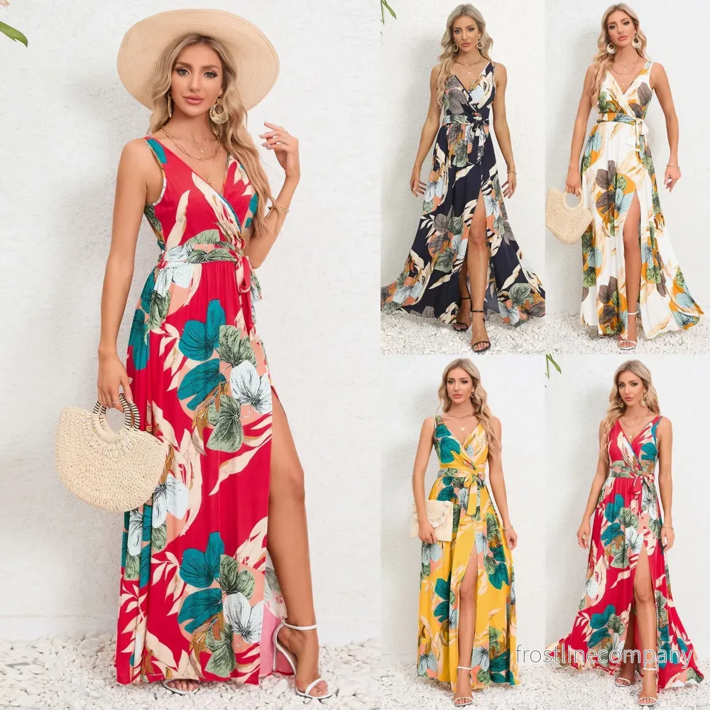 Lång sommarklänning med V-ringning och Blommig Design – Elegant Maxiklänning med Slits för Dam Lång sommarklänning med V-ringning och Blommig Design – Elegant Maxiklänning med Slits för Dam