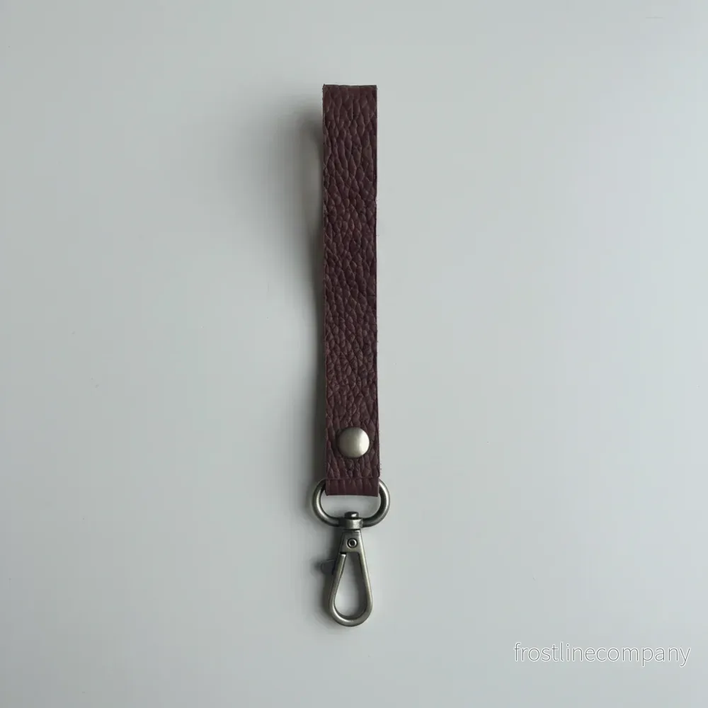 Läderrem, cognac. Smal modell. 1,6 x 17 cm. Jeanskrok Läderrem, cognac. Smal modell. 1,6 x 17 cm. Jeanskrok