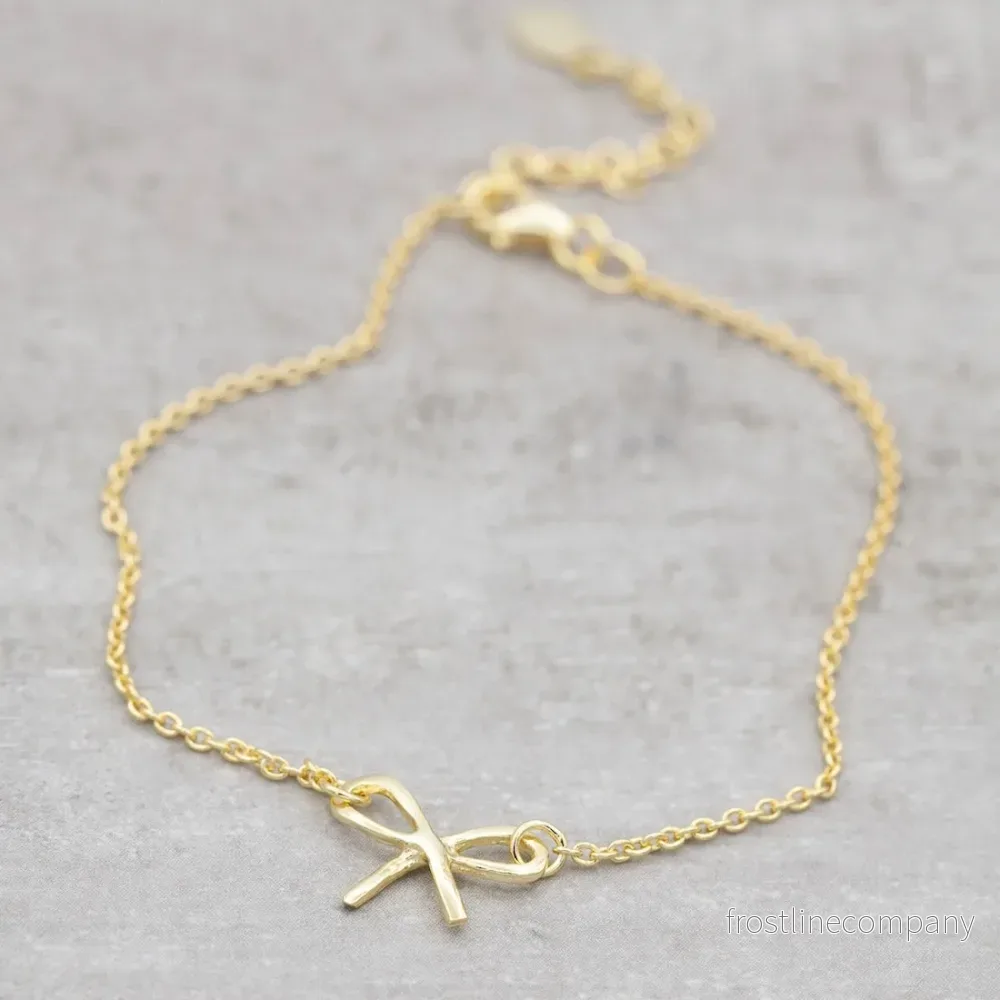 Armband i guld rosett - Bild 2